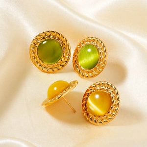 Vintage gold-rimmed round cat-eye stone stud earrings in candy green and yellow colors