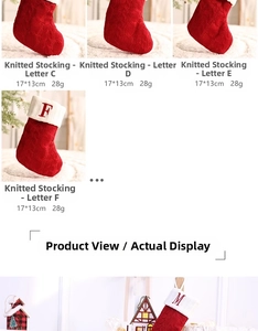 Detailed cable knit pattern on red Christmas stockings with white embroidered letters