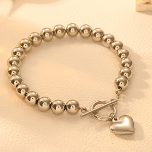 Elegantes Edelstahl-Perlenarmband mit OT-Verschluss und poliertem Herzanhänger