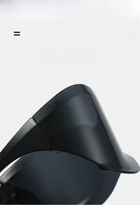 Macro detail of lightweight and elastic translucent black Y2K wraparound sunglasses frame