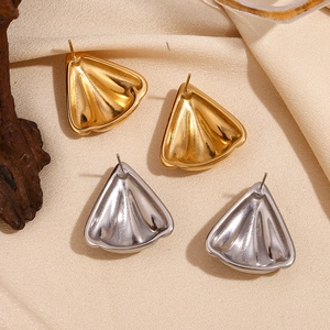 Detailed back view of geometric triangle petal earrings in gold and silver finish