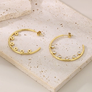 Elegant gold-plated C-shaped stainless steel hoop earrings with sparkling cubic zirconia