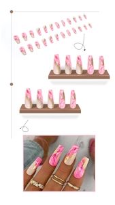Macro view of long coffin nails with pink marble texture and gold glitter accents