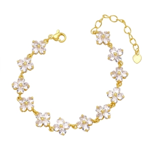 Elegant gold flower bracelet featuring sparkling zircon petals and adjustable lobster clasp