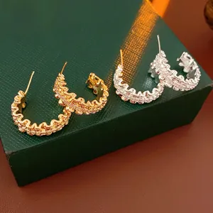 Elegant 18k gold plated C-shaped wave stud earrings with sparkling micro zircons