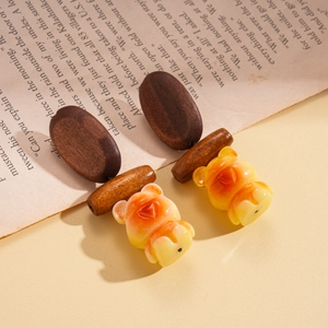 Retro resin bear earrings with wooden oval studs and warm yellow-orange gradient