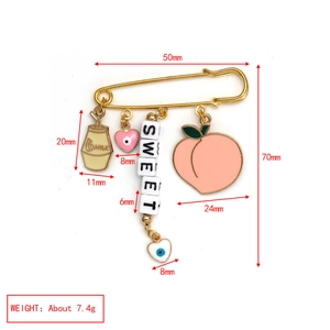 Detailed size specifications for a gold evil eye safety pin brooch with charms