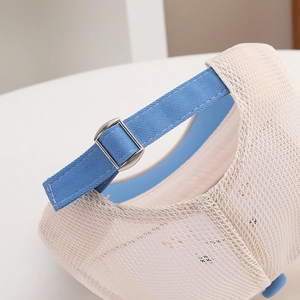 Close-up of breathable mesh back and adjustable metal buckle on kids baseball cap