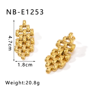 Detail view of gold geometric earrings with watch-strap texture and size dimensions
