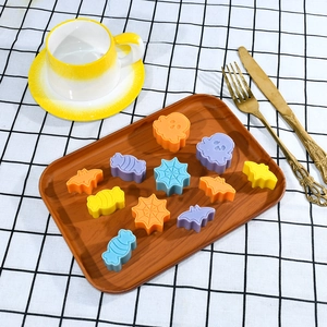 Close-up of Halloween ghost and bat silicone molds for DIY candy and soap making