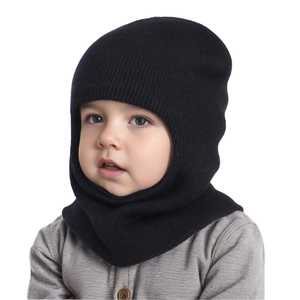 Detail of a child wearing a black knitted balaclava hat with soft ribbed texture