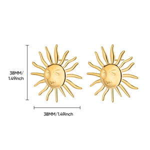 Detail view of 38mm golden sun earrings with face engraving and radiating rays