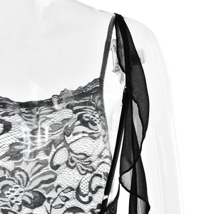 Détail de la dentelle noire transparente et du motif floral sur le corsage sexy