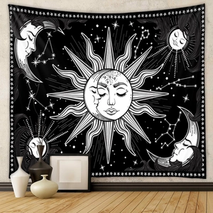 Detail of mystical sun and moon tapestry with fine fabric texture and celestial patterns