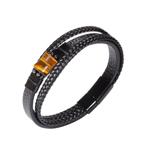 Detailed view of multilayer leather bracelet with tiger eye stone and magnetic clasp