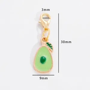 Macro view of avocado enamel charm with dimensions 30mm x 9mm and lobster clasp detail