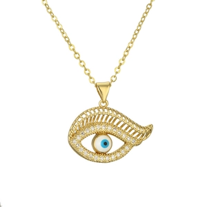 Gold Evil Eye pendant necklace with blue crystals and clear zircons on O-chain link