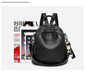 Detailed size comparison of the soft leather backpack with an A4 magazine and iPad