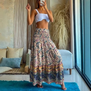 Women's summer set with white crop top and bohemian floral tiered maxi skirt