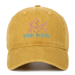 Macro shot of fine embroidery featuring a female silhouette and text on a cotton baseball cap