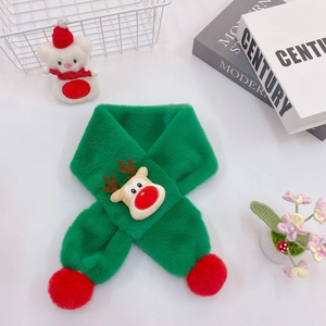 Detail of green plush kids scarf featuring a 3D Christmas reindeer and red pom-poms