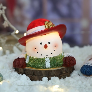 Cute glowing resin snowman figurine with red hat and green scarf for Christmas decor