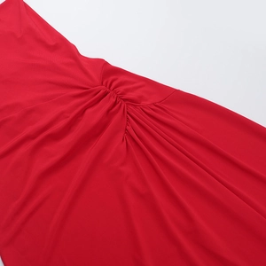 Detail of red ruched fabric with gathered seam design on a sexy bodycon dress