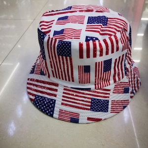 Fashionable double-sided bucket hat featuring vibrant American flag stars and stripes print