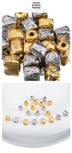 Macro shot of 5x6mm hammered copper beads in gold and silver for DIY jewelry making