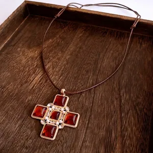 Vintage cross necklace with amber gemstones and pearls on brown adjustable cord