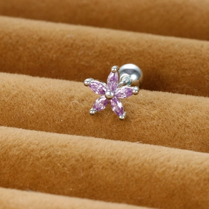 Macro shot of purple marquise zircon flower stud earring with secure ball back