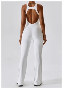 Detail of white backless flare yoga jumpsuit with U-back design and high elasticity fabric