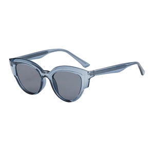 Fashionable blue cat-eye sunglasses with gray lenses and transparent resin frame