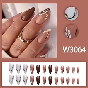 Brown leaf-patterned stiletto press-on nails with gold accents, set of assorted sizes