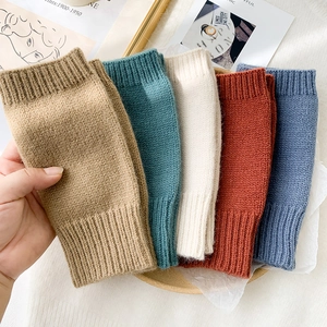 Cozy knit fingerless gloves for women in five colors including camel and dark green