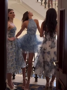 Three styles of blue floral chiffon mini dresses showing tiered ruffles and halter neck detail