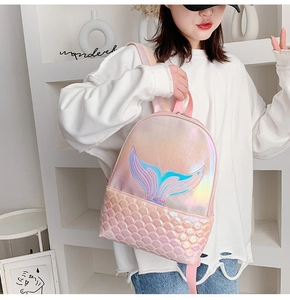 Detailed view of holographic mermaid backpack showing sequin tail and fish scale texture