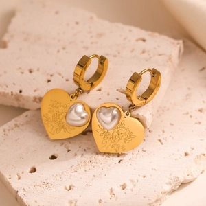 Gold-plated hoop earrings with tree of life heart pendant and central pearl inlay