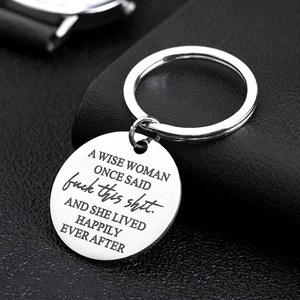Polished stainless steel keychain with inspiring engraved quote on black leather