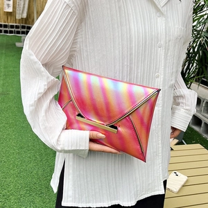 Pink rainbow gradient envelope clutch with metallic finish and metal buckle detail