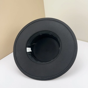 Detail view of the fedora interior showing the size 58 label and cotton blend material