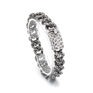 Vintage stainless steel Cuban link bracelet for men with unique hammered texture in antique silver