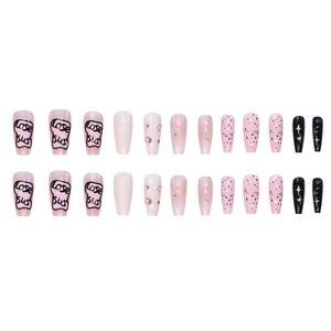 Pink graffiti press-on nails with text, glitter, and rhinestones in medium long coffin shape