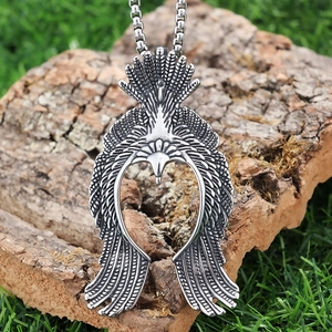 Vintage stainless steel flying eagle pendant with detailed feathers on a chain