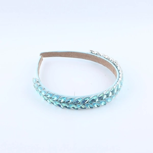 Close-up of light blue crystal headband with marquise stones and anti-slip lining