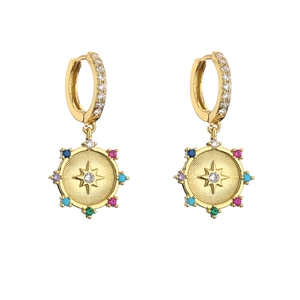 Detail of gold hoop earrings with starburst pendant and multicolor zircon stones