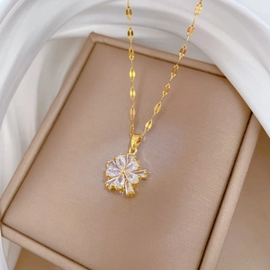 Elegant gold double-layer flower pendant necklace set with sparkling micro-inlaid stones