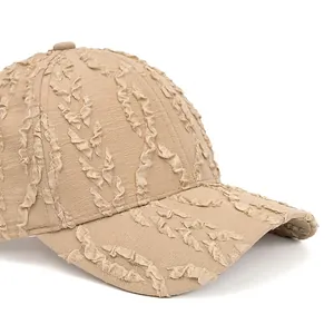 Beige baseball cap with seersucker texture and wide brim from a 45-degree angle