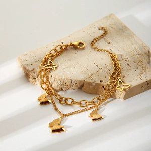Double-layered 18k gold plated stainless steel butterfly charm bracelet on stone base