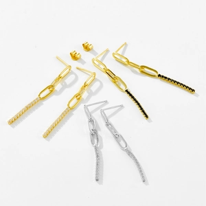 Détails des boucles d'oreilles trombone avec oxydes de zirconium en or et argenté